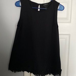 Black blouse with floral design at bottom